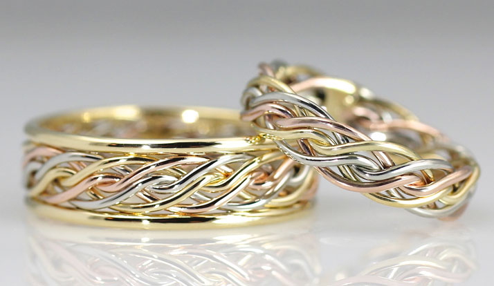 This is a tri-color wedding ring braided by Todd Alan. It is a unique wedding ring braided together with six wires in different colors.