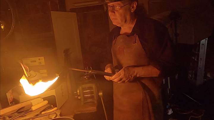 Artist Todd Alan handmakes all his braided wedding rings. Get a ring handmade by artist Todd Alan. This photo shows him using a torch to braid and weave his rings