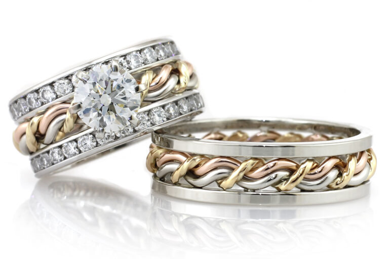 Handmade wedding ring set. Unique braided ring. This is a braided wedding ring with a diamond next to a ring that is just a braided ring with square outer bands. This set also had diamond anniversary bands attached to the cord of three braided ring