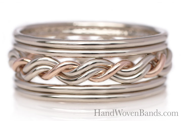 This is a white gold ring with one strand in 14k rose gold. It is a braided wedding ring with double outer bands. Todd Alan handmade this braided ring.