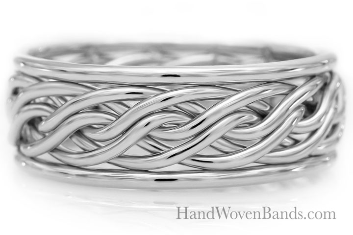 White gold woven wire bracelet on a white background with the text "handwovenbands.com" visible.