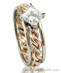 This is a braided engagement ring set with a princess cut diamond and our cord of three ring set. This has three colors and is handmade by artist Todd Alan.