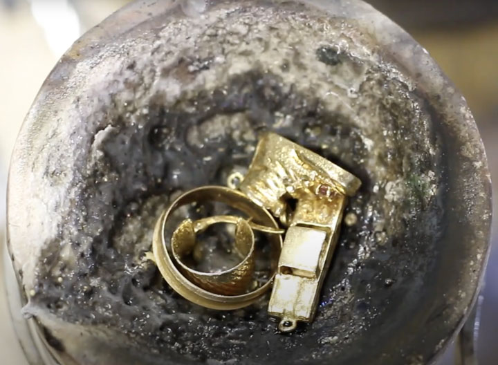 Recycling gold into a new piece of jewelry. This is an up-close shot of the gold before it is melted down an pulled into a new ring