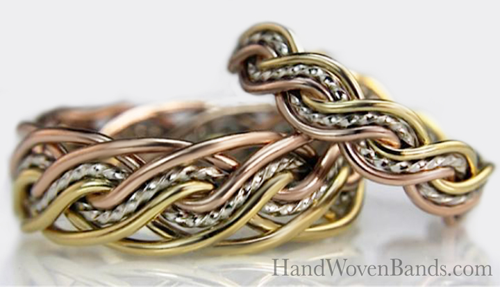 This is a combination of two braided wedding rings. The one on the left is a tri-tone eight strand braided ring. The one of the right is a six strand closed weave tri-color braided band.