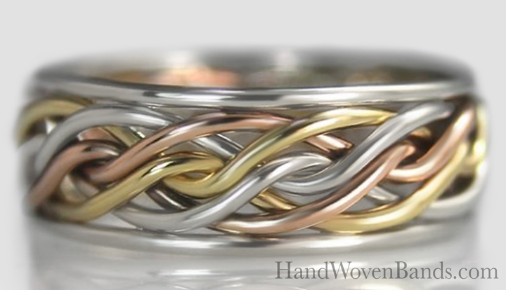 unique-braided-wedding-ring-set-plate-35 This is a six strand open weave with tri-tone braided wedding rings. This braided ring is made with three different colors woven together and braided by a jewelry artist.