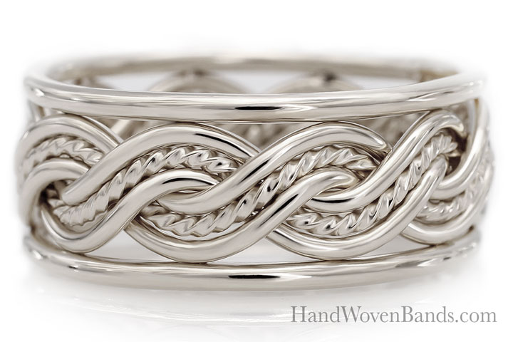 Intricately handwoven silver bracelet with a six strand closed weave design, displayed on a white background.