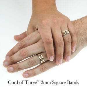 Gold and silver Cord of Three™ square rings with handwoven design, unique wedding bands by Todd Alan.